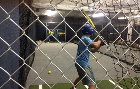 Baseball player in South Bay Sports Training Batting Cages using slowpitch and fastpitch