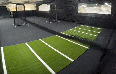 Indoor facility rentals featuring multiple batting cages with turf lanes and netted training areas for team practices and private events
